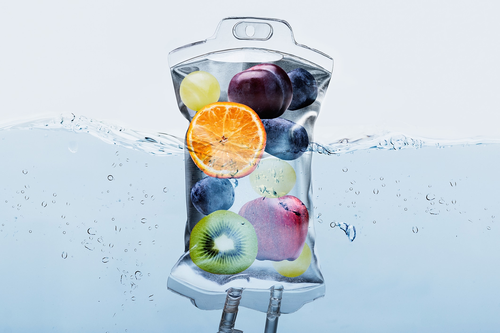 Fruit inside a water-filled IV bag.