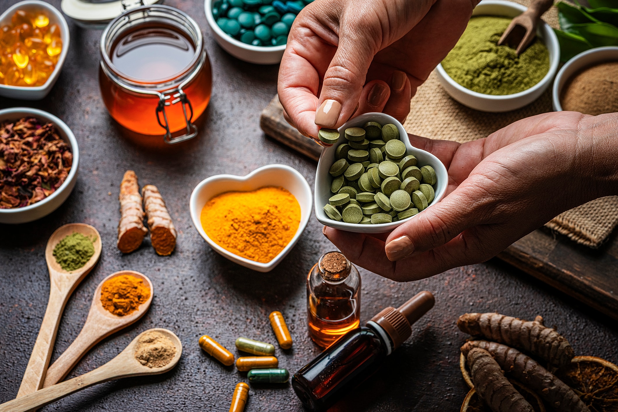 Herbal supplements and natural remedies on table.